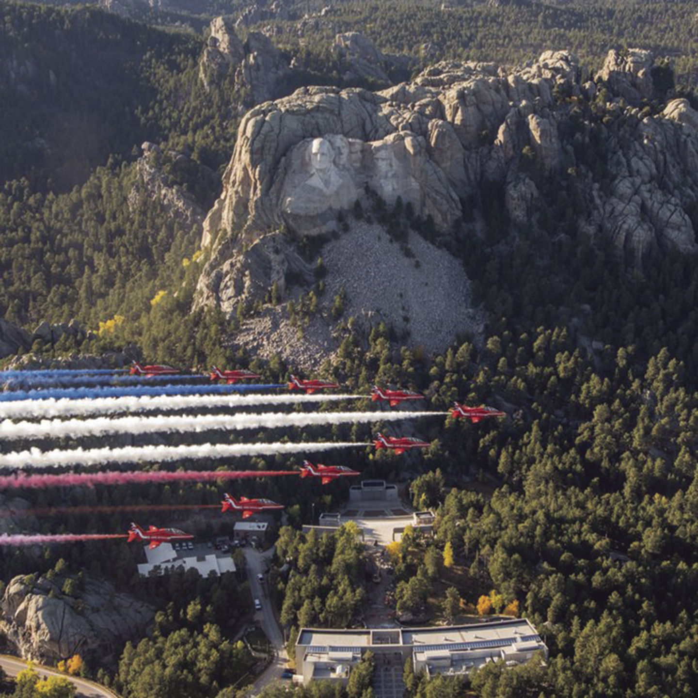 Red Arrows dart across Mt. Rushmore